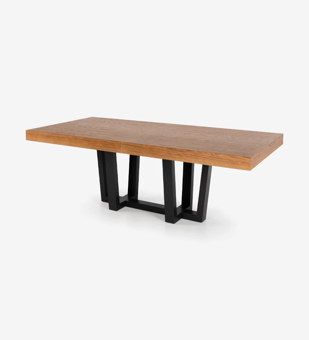 Table de repas rectangulaire extensible avec plateau en chêne miel et pied laqué noir.