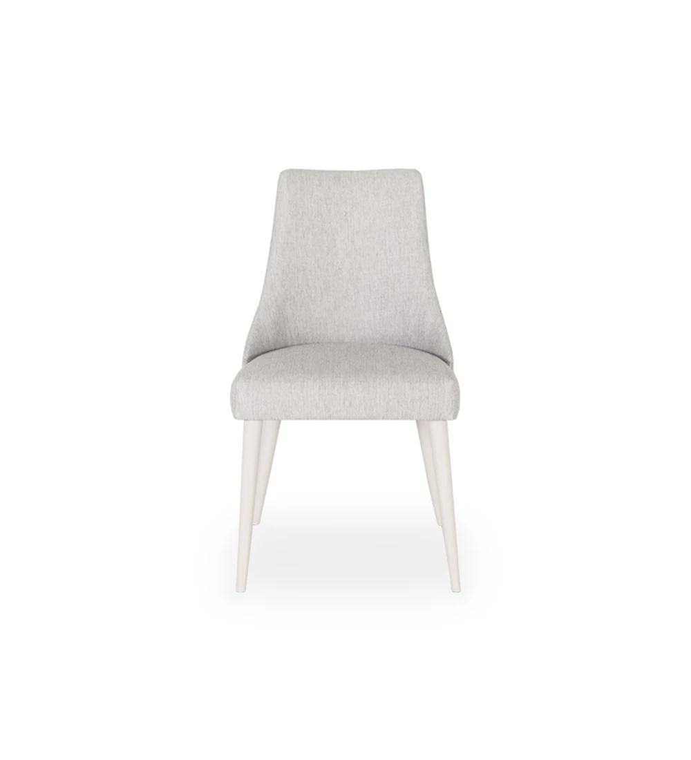Oslo chair upholstered in light gray fabric, pearl lacquered feet.