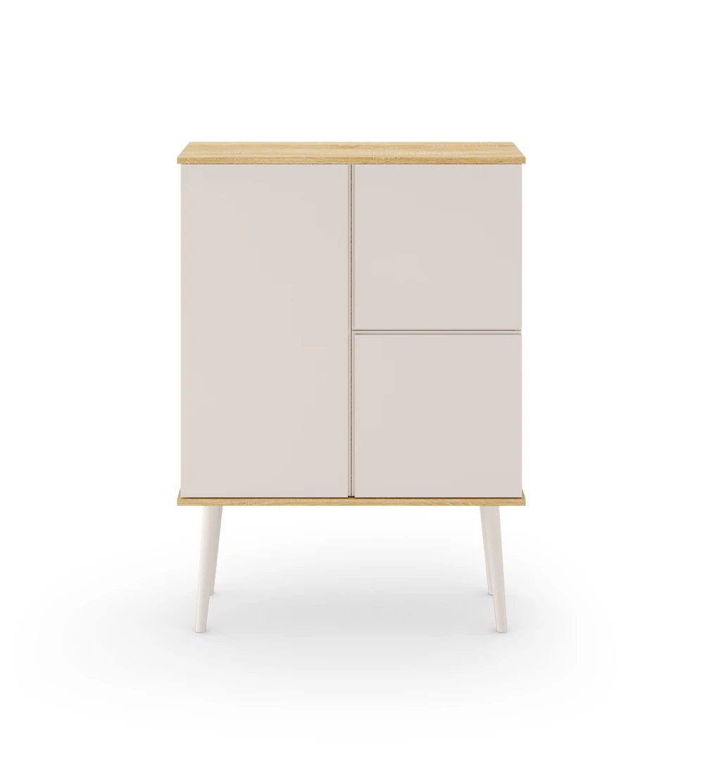 Oslo cupboard with 3 doors and pearl lacquered feet, structure in natural oak, 100 x 137,7 cm.
