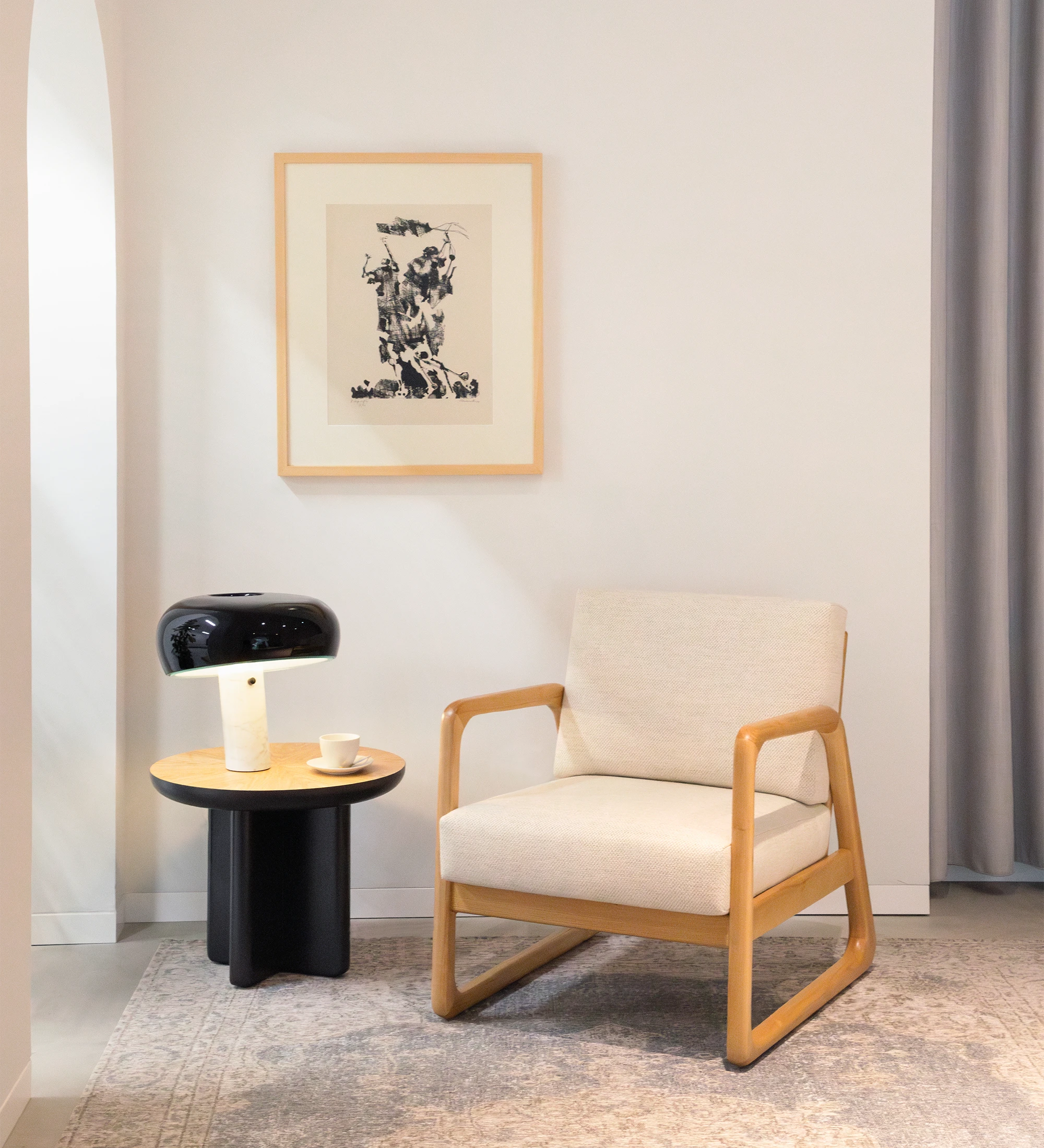 Antarte by AI Armchair upholstered in beige fabric, structure in natural wood.