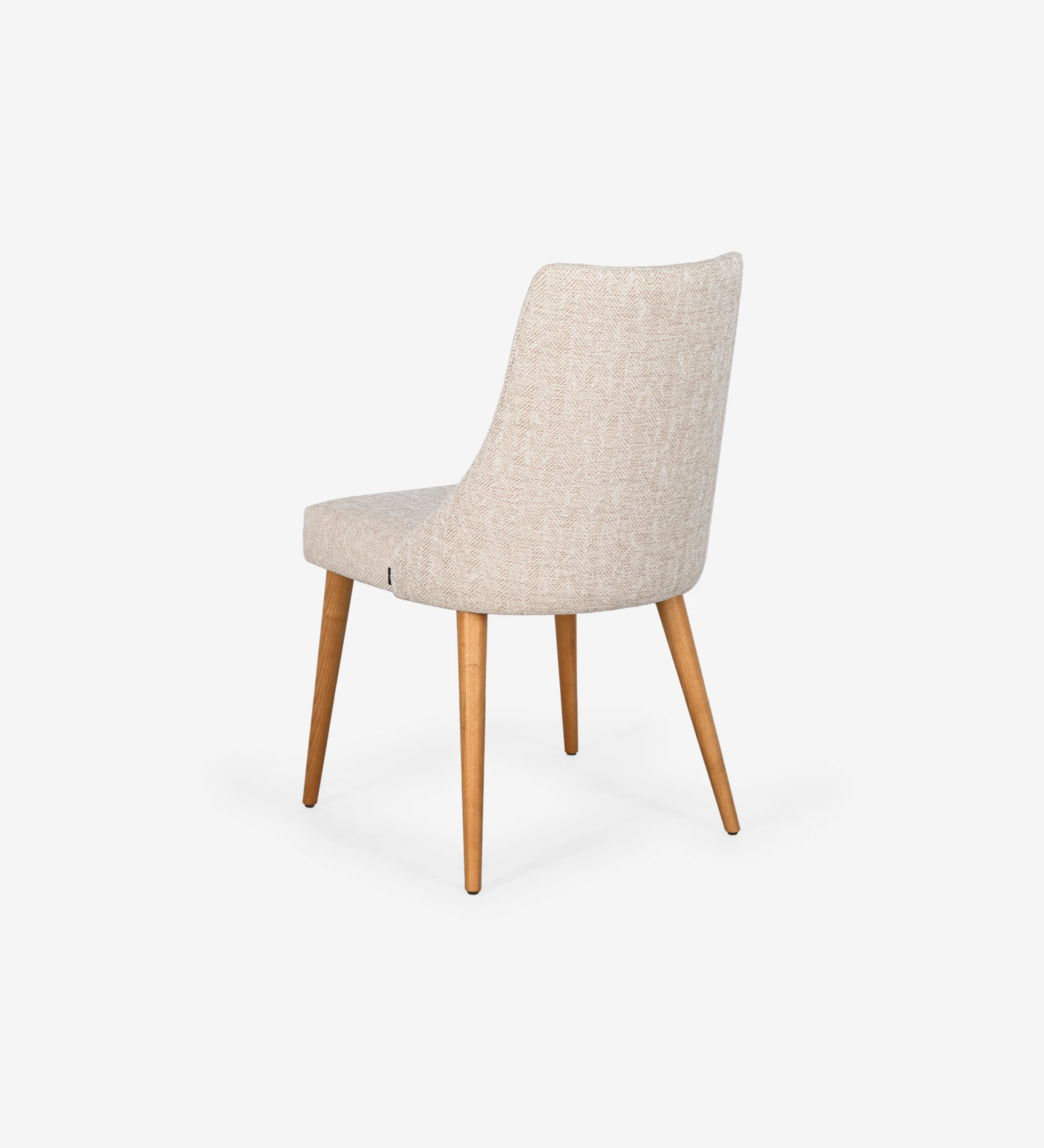 Oslo chair upholstered in beige fabric and honey-colored wooden legs.