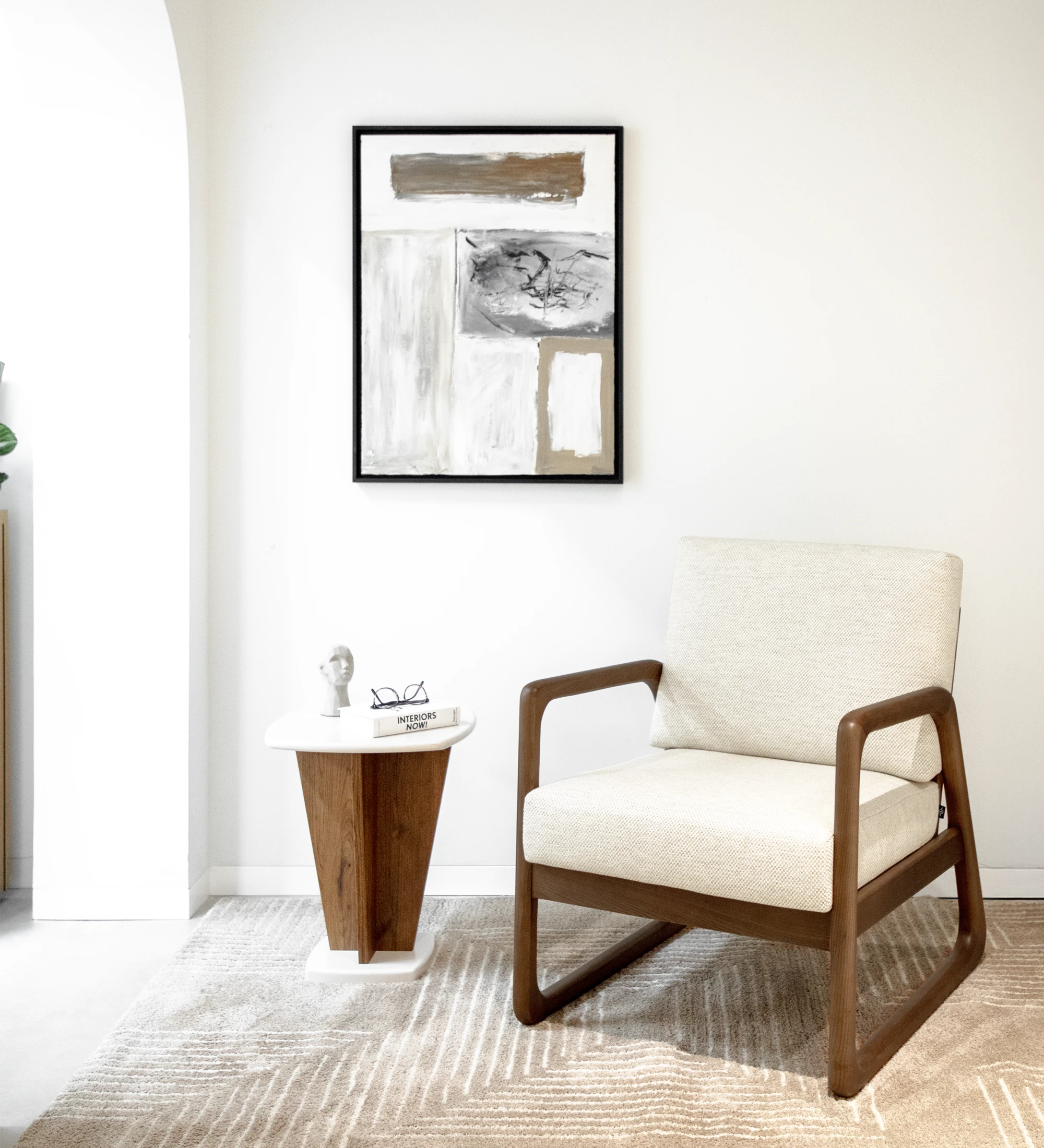 Antarte by AI Armchair upholstered in beige fabric, structure in walnut colored wood.