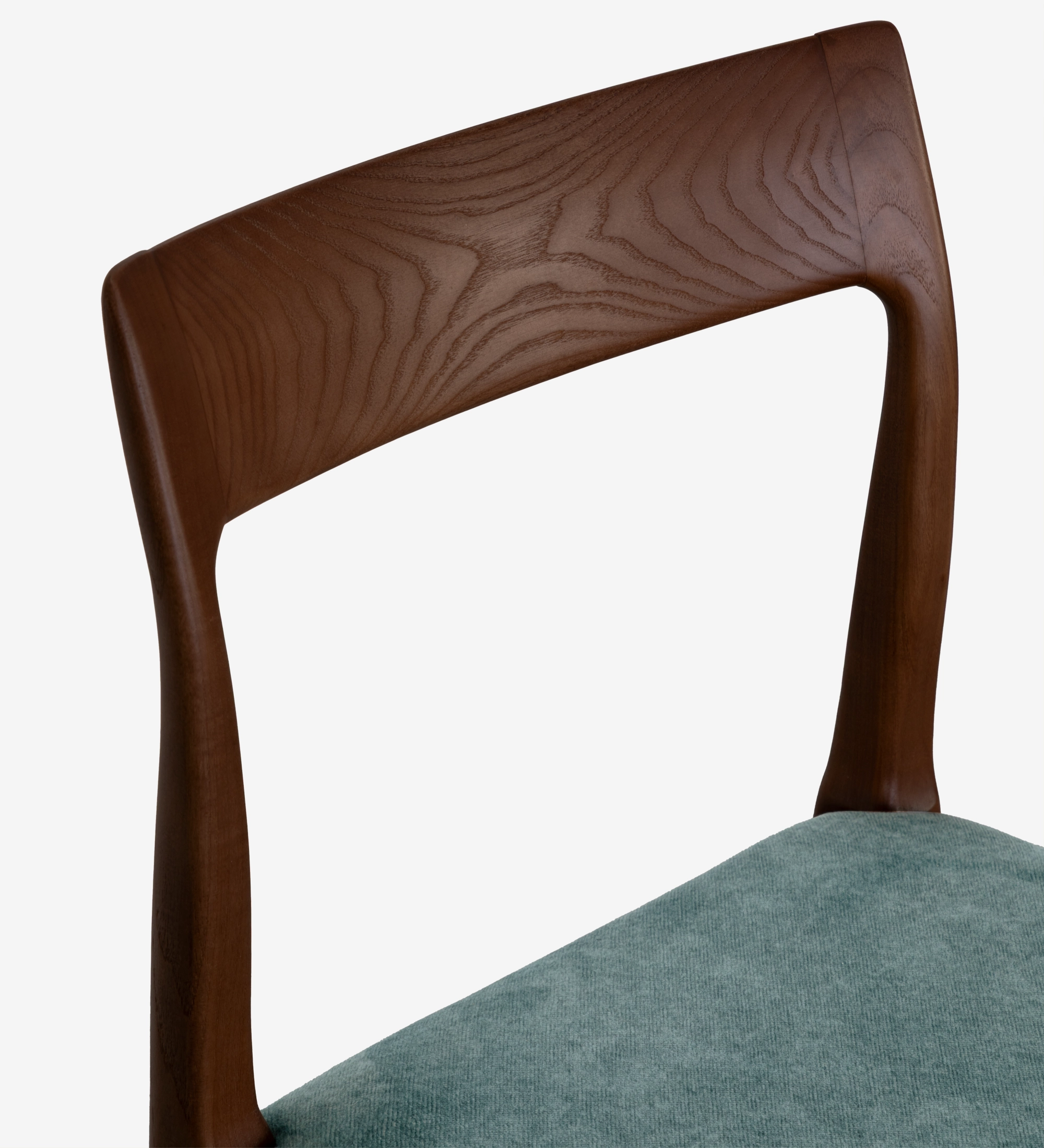 Walnut colored wooden chair with seat upholstered in blue fabric.