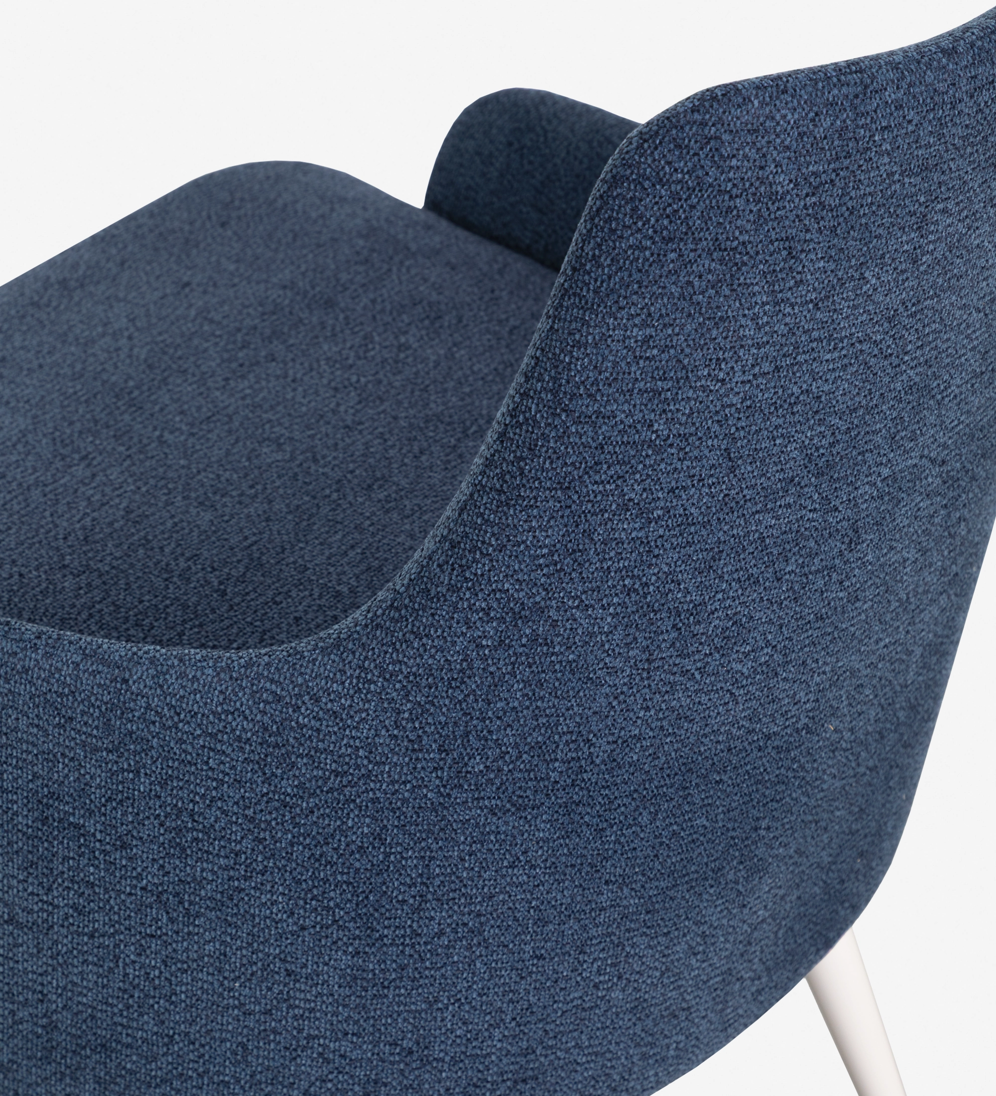 Oslo armchair upholstered in blue fabric, pearl lacquered feet.