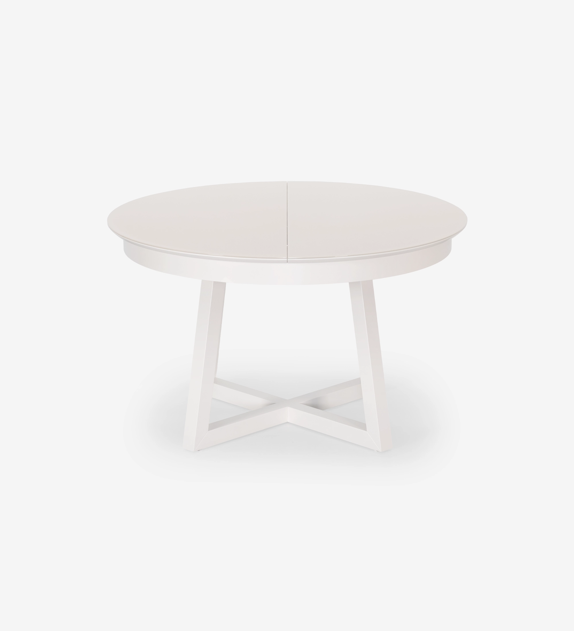 Mesa de comedor redonda extensible en lacado perla con tapa de cristal y extensión en lacado perla.