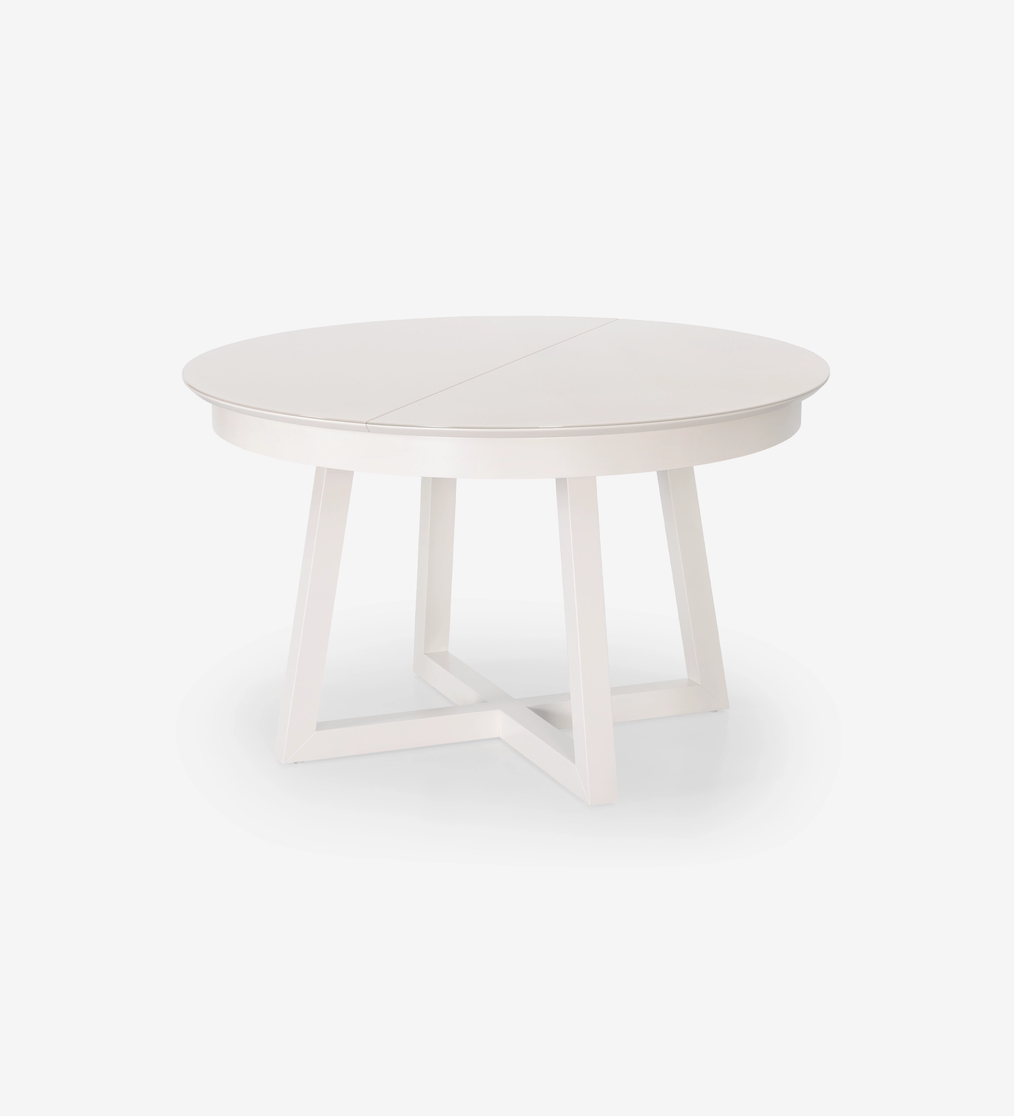 Mesa de comedor redonda extensible en lacado perla con tapa de cristal y extensión en lacado perla.