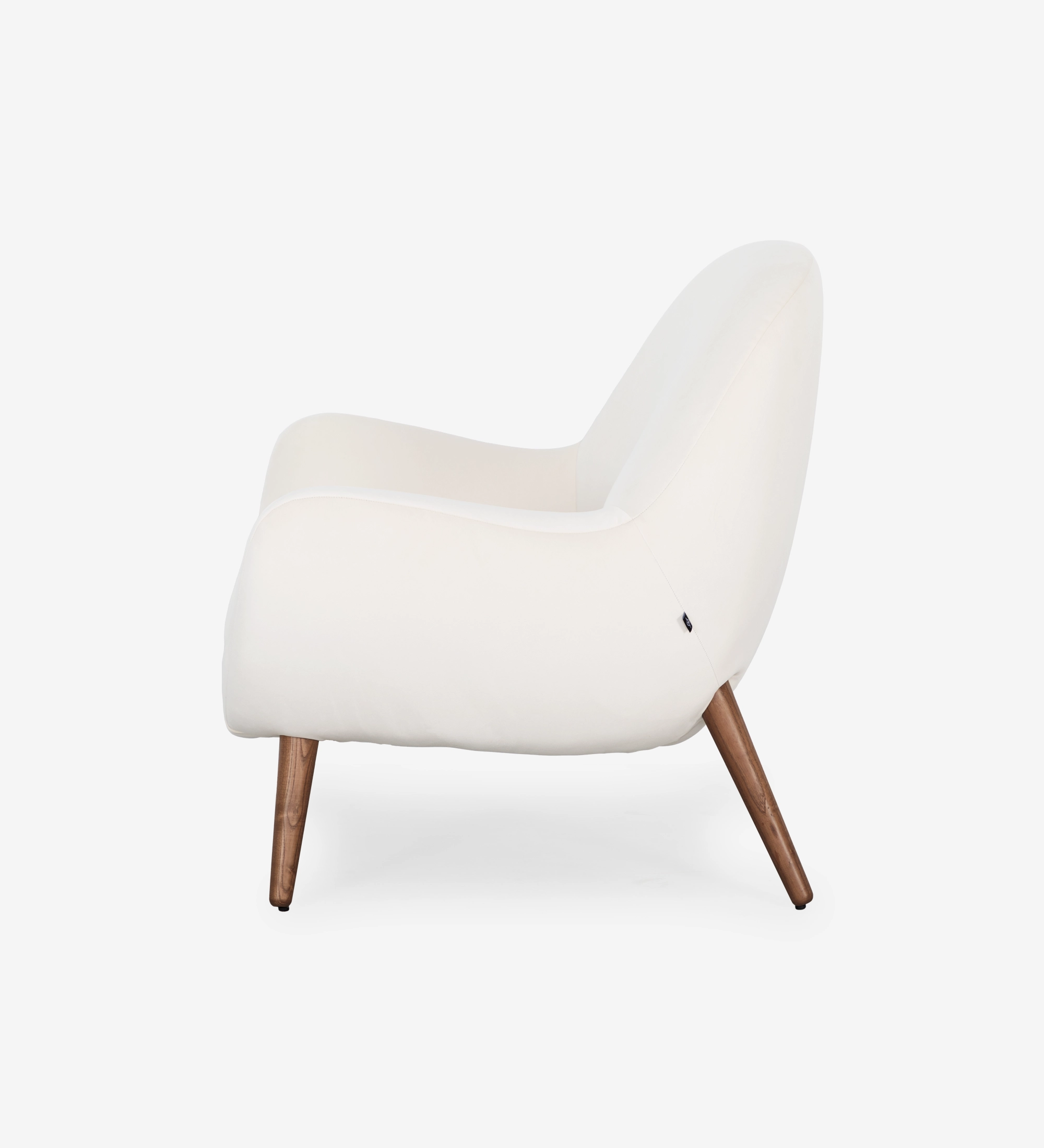 Oslo armchair upholstered in pearl fabric with walnut-stained ash wood legs.