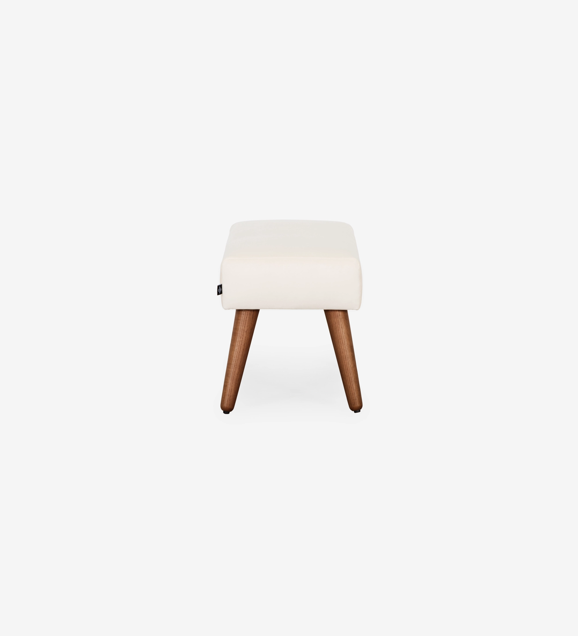 Upholstered in pearl fabric with walnut-colored ash wood legs.