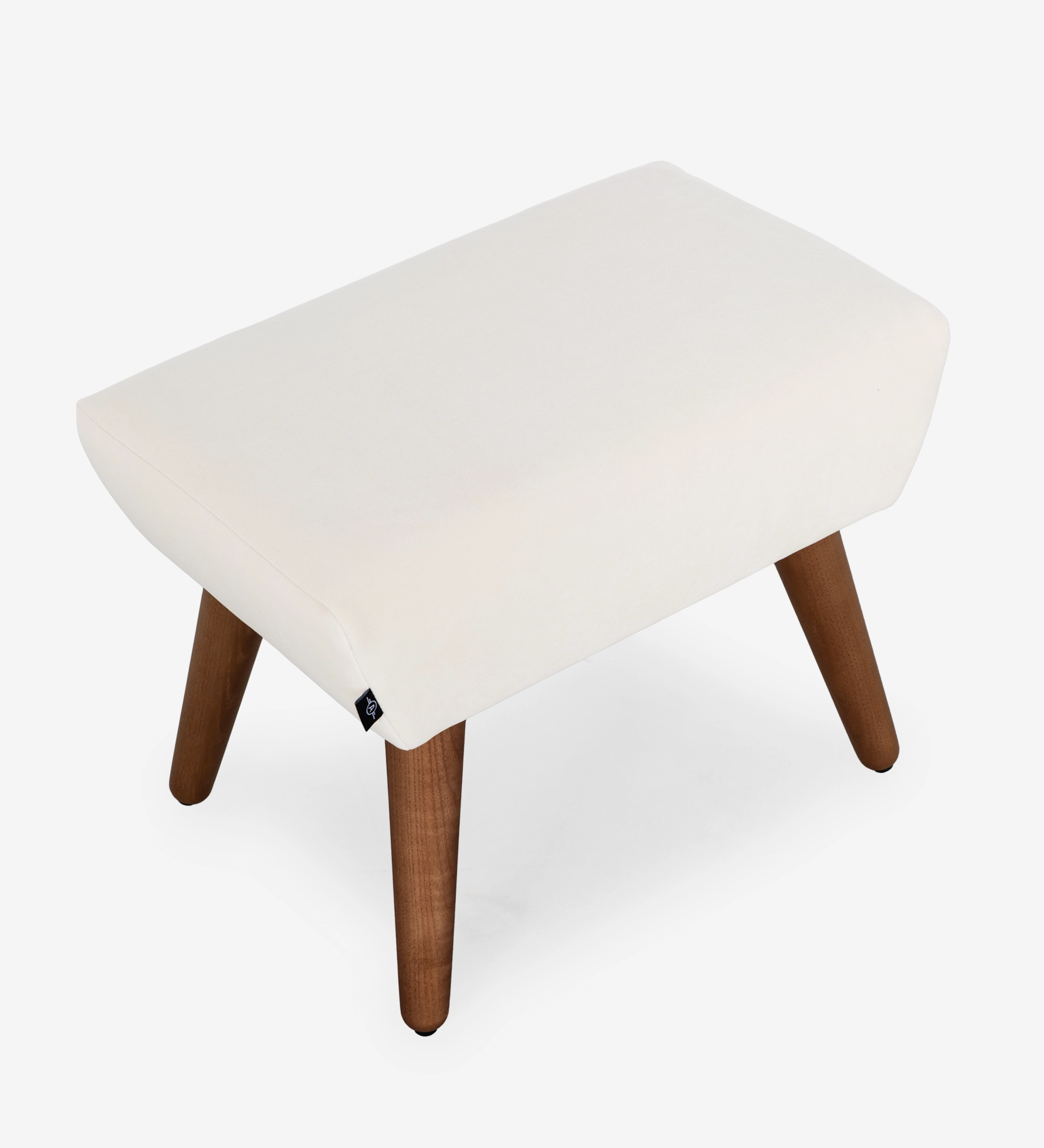 Upholstered in pearl fabric with walnut-colored ash wood legs.