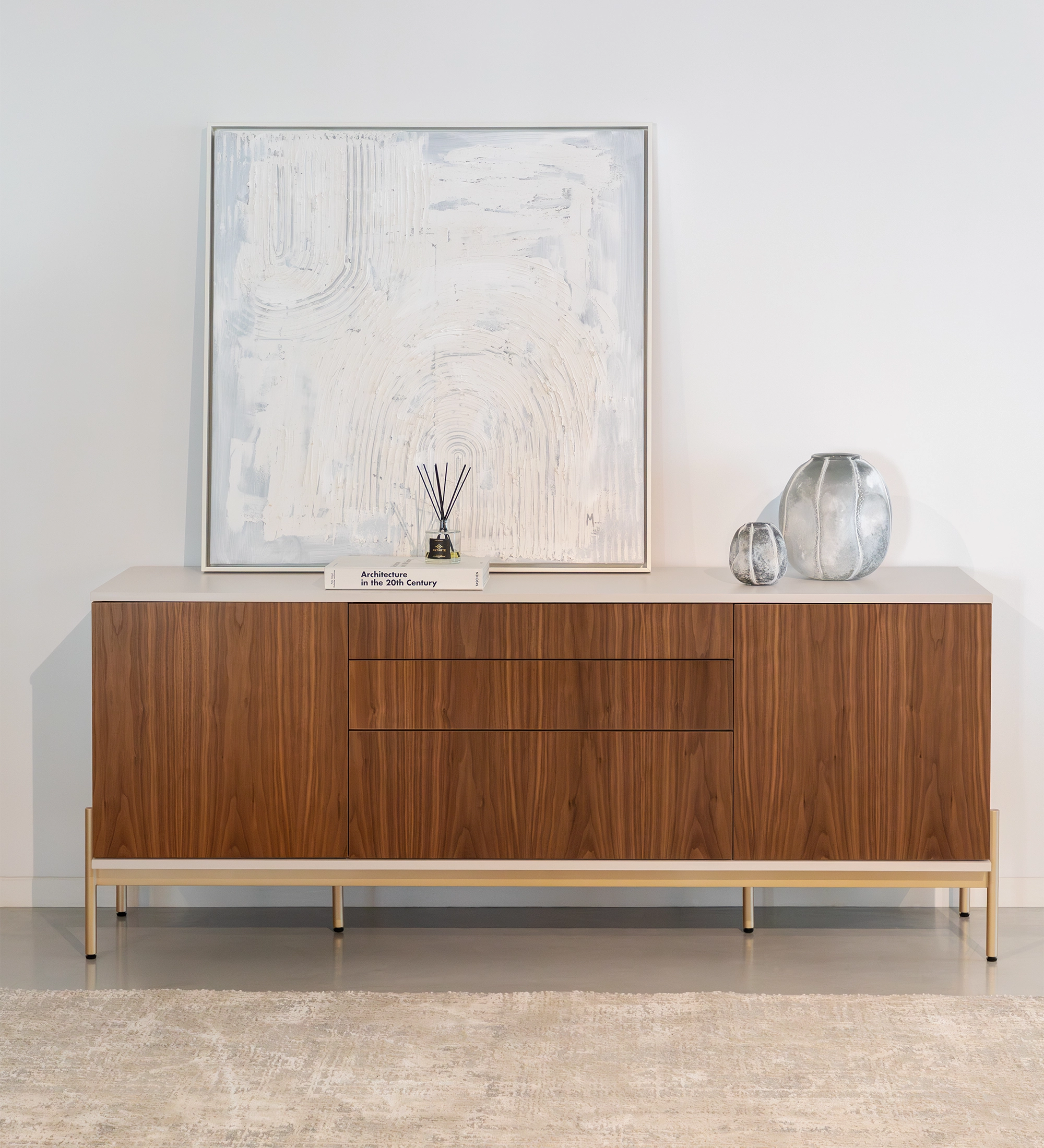 Sideboard with 2 doors, 1 hinged door and two natural walnut drawers, pearl structure and gold lacquered metal legs with levelers.