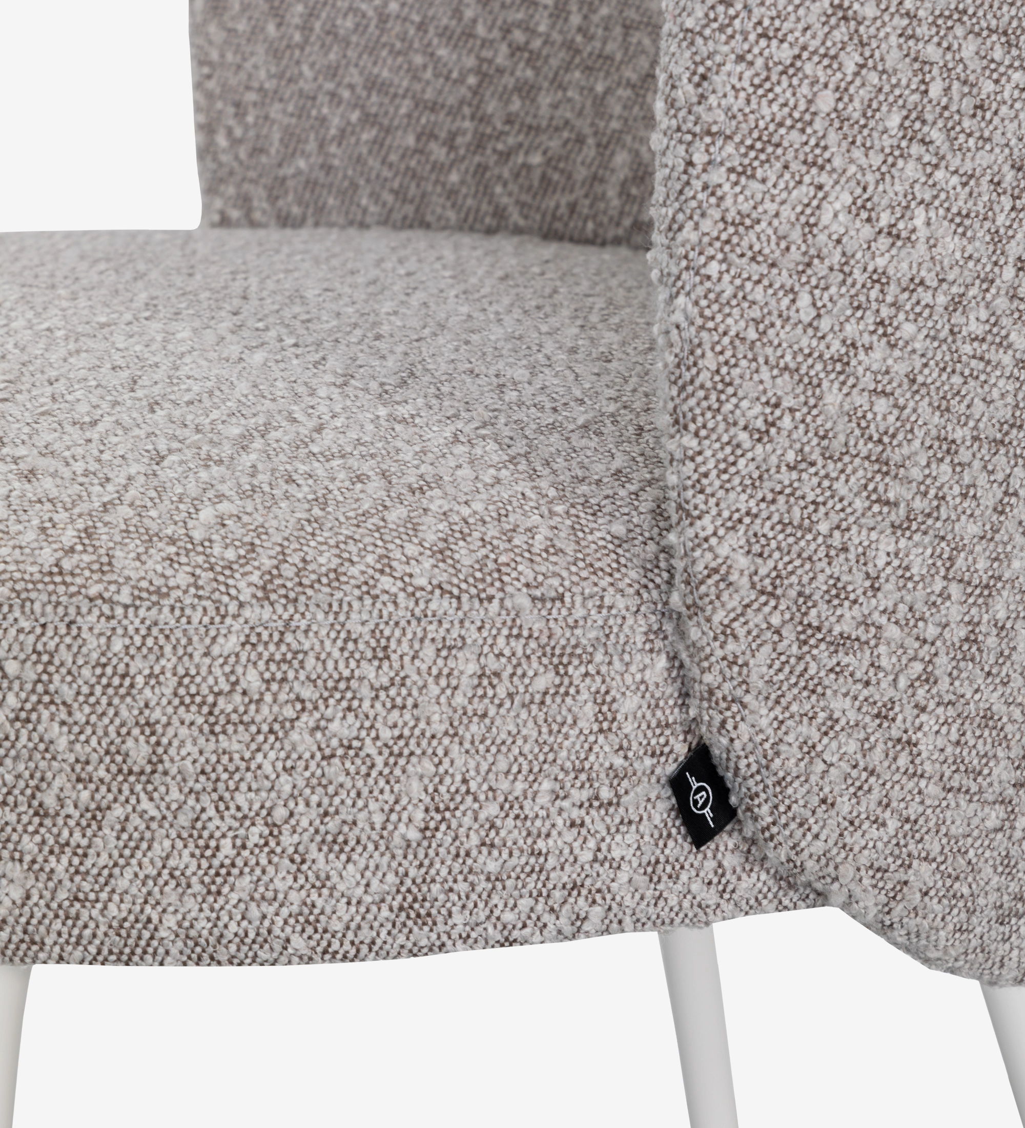 Geneve armchair upholstered in toffee fabric, pearl lacquered feet and golden detail.
