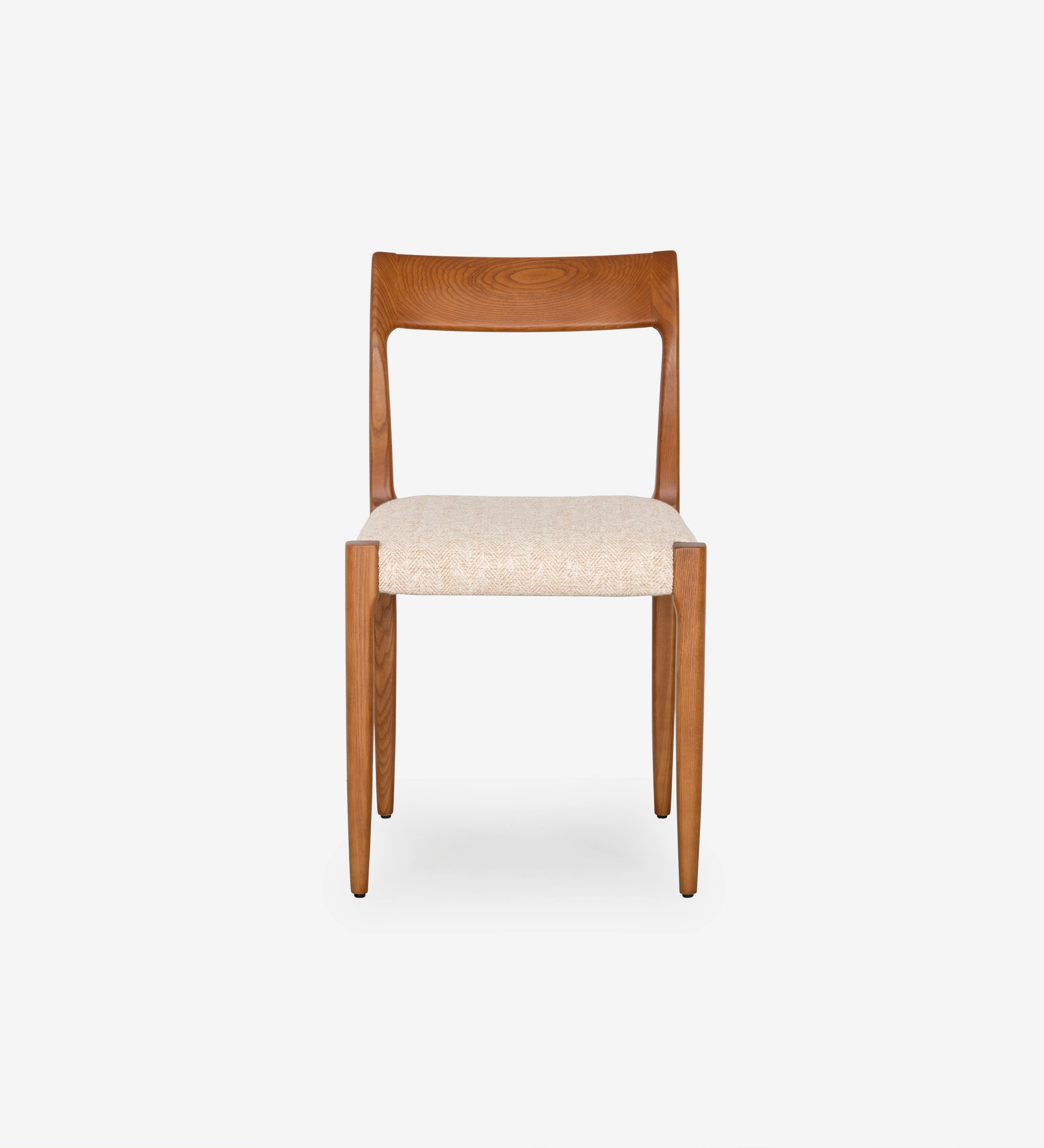 Chair in honey colored ash wood with beige fabric upholstered seat.