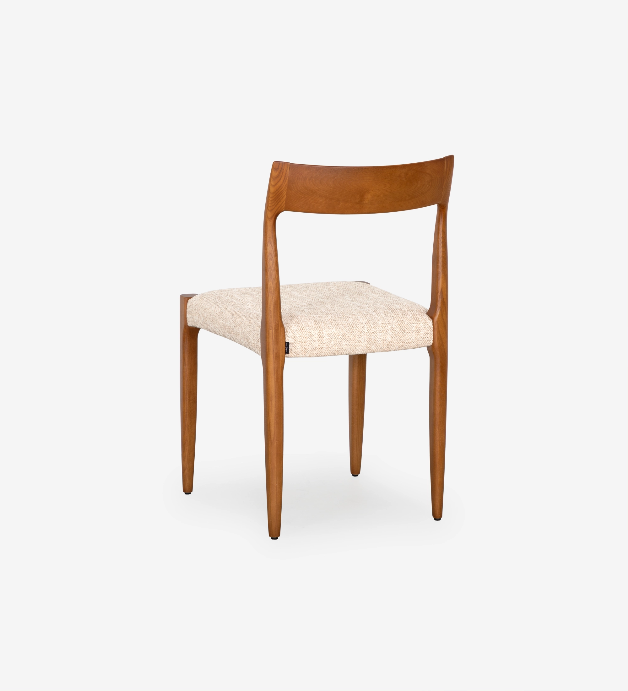 Chair in honey colored ash wood with beige fabric upholstered seat.