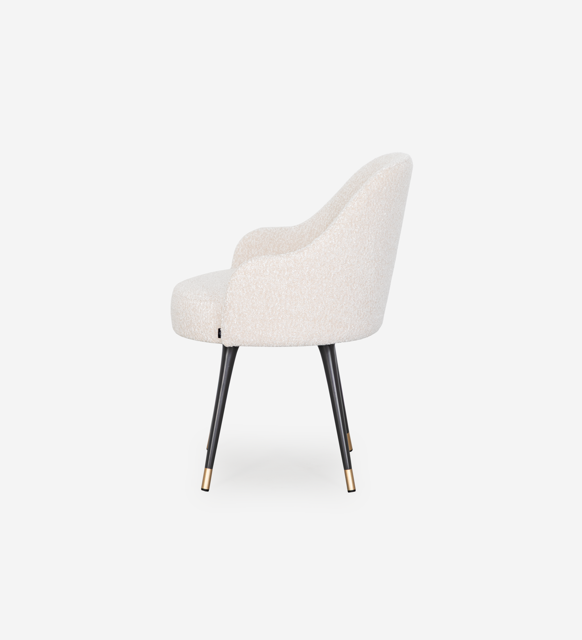 Pearl fabric upholstered swivel chair with black lacquered legs and gold detailing.