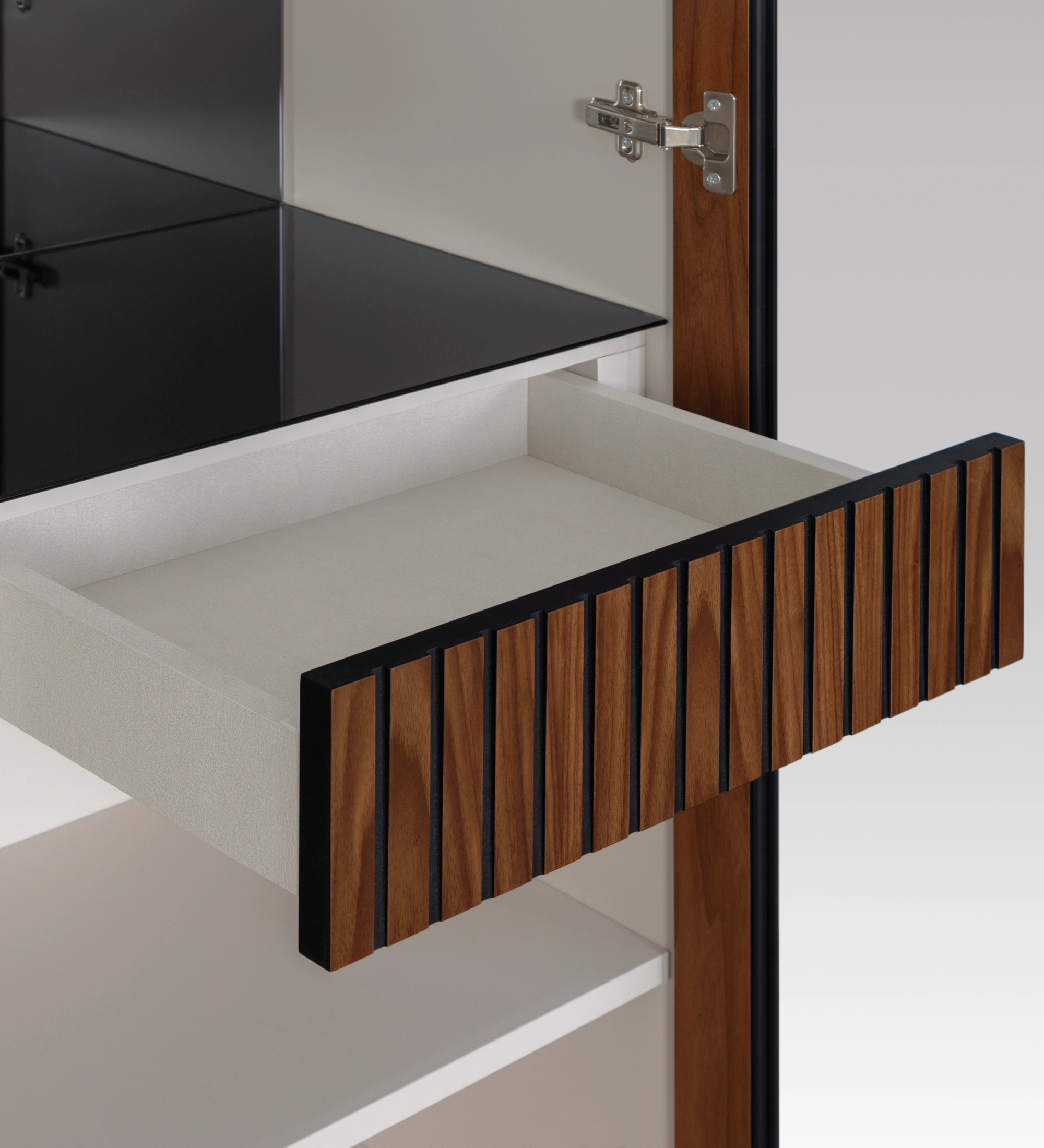 Cannes Wine Cellar drawer with slatted walnut front and black interior