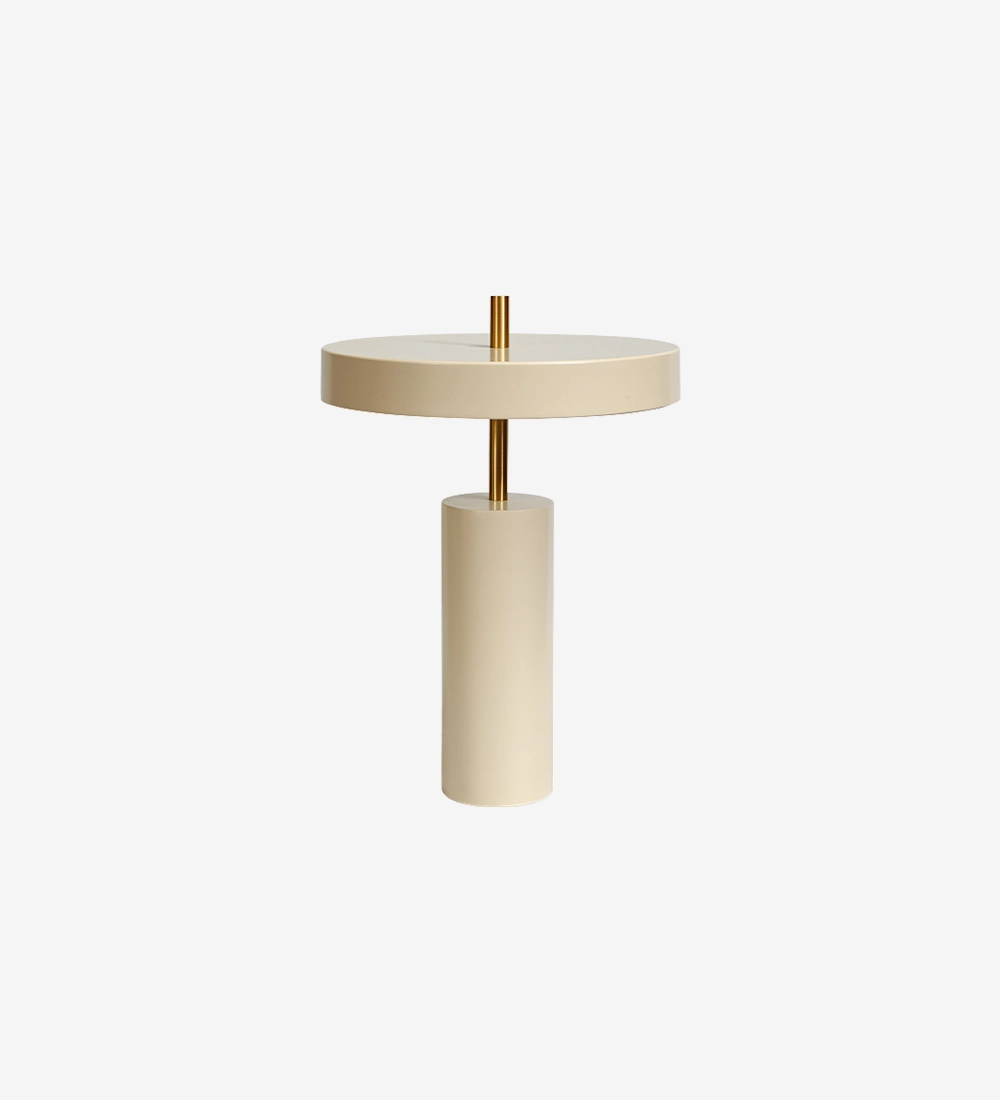Barcelona table lamp in beige with cylindrical base, flat disc shade and brass rod