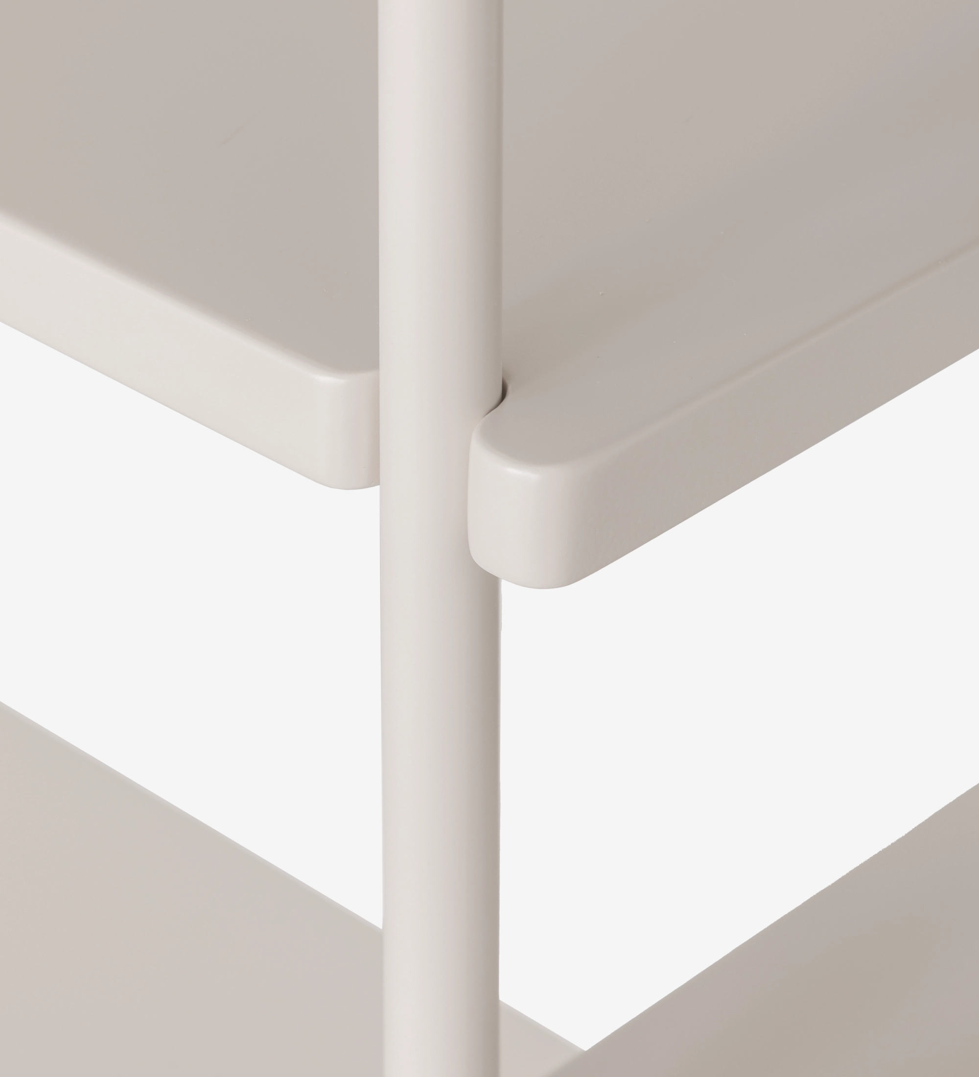 Detalle de esquina del Estante Paris en acabado crema con poste redondeado