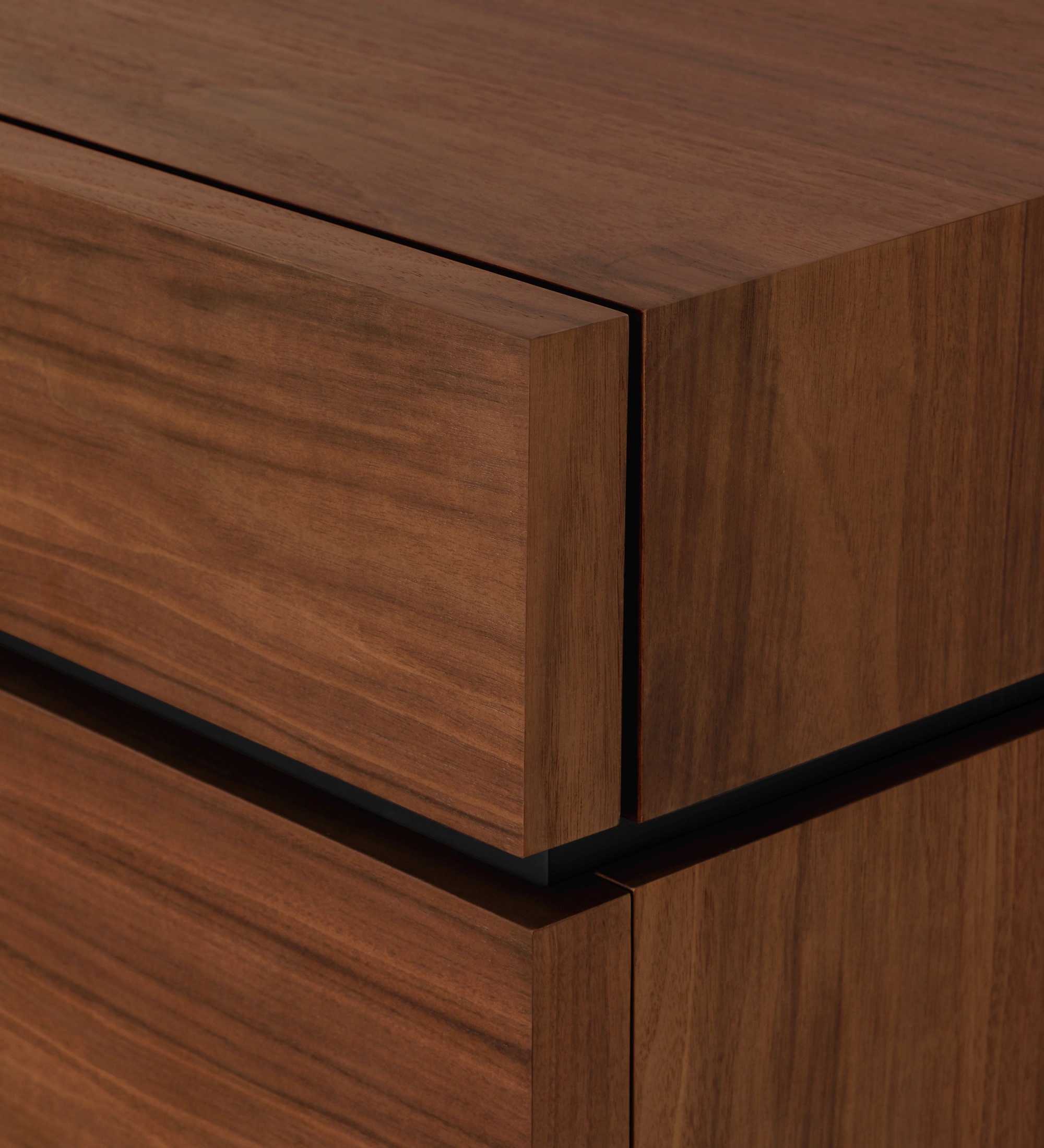 Close-up of Nice Sideboard walnut wood corner and recessed handle gap