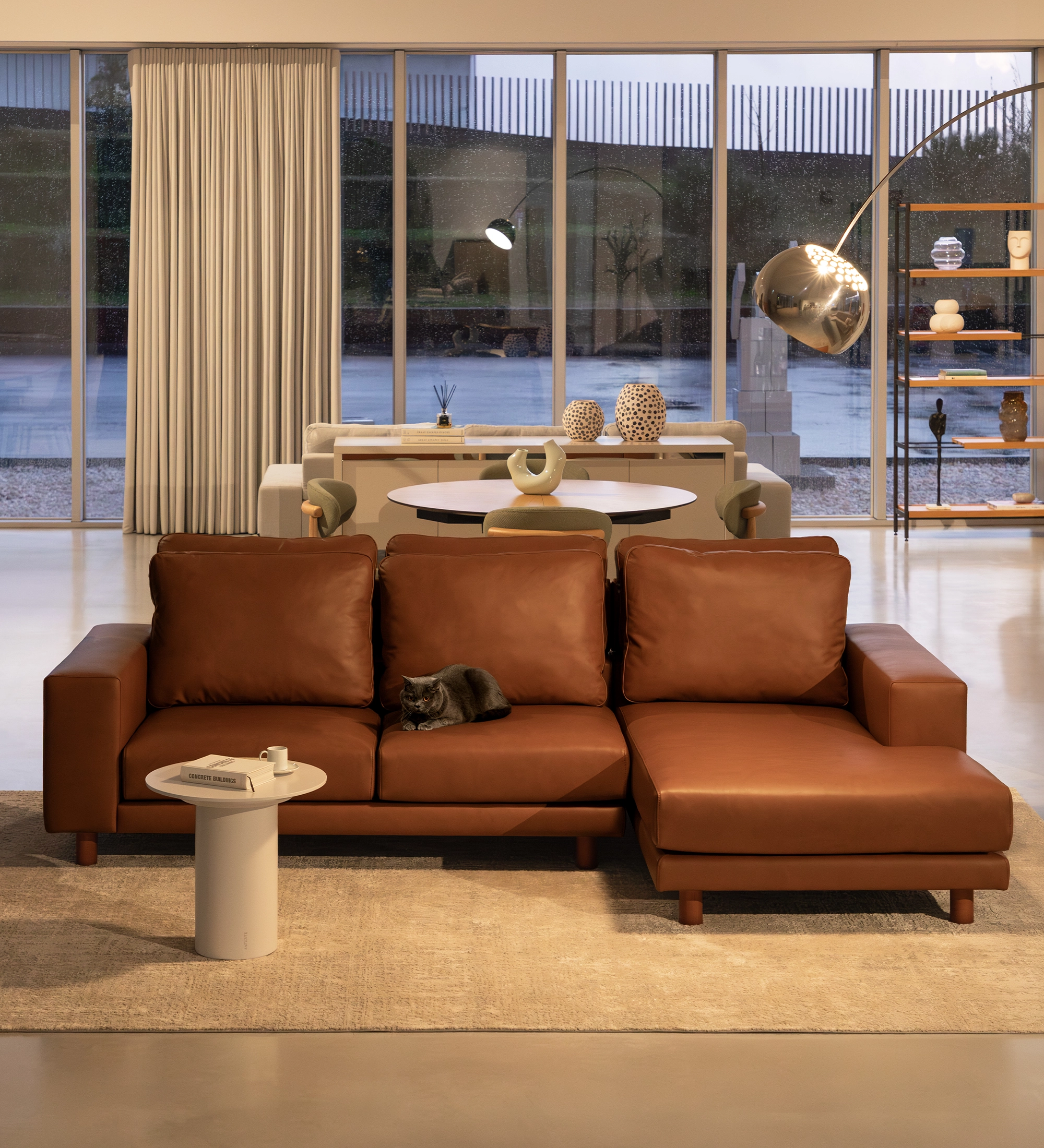 Dallas sofa with chaise longue in brown leather, cat sleeping on middle cushion