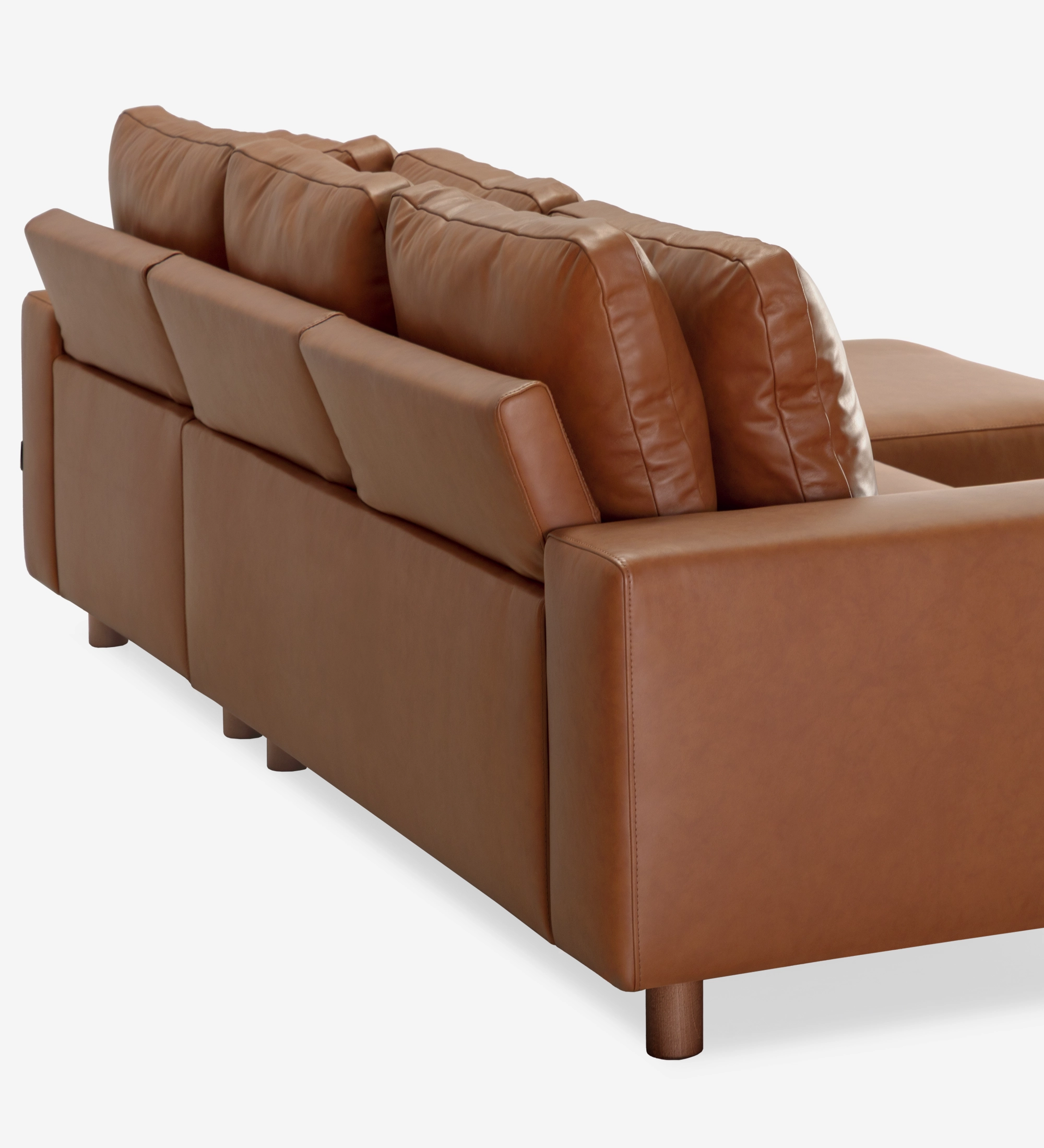 Dallas leather sofa with chaise longue, rear-side view showing cushions, arm and wooden legs