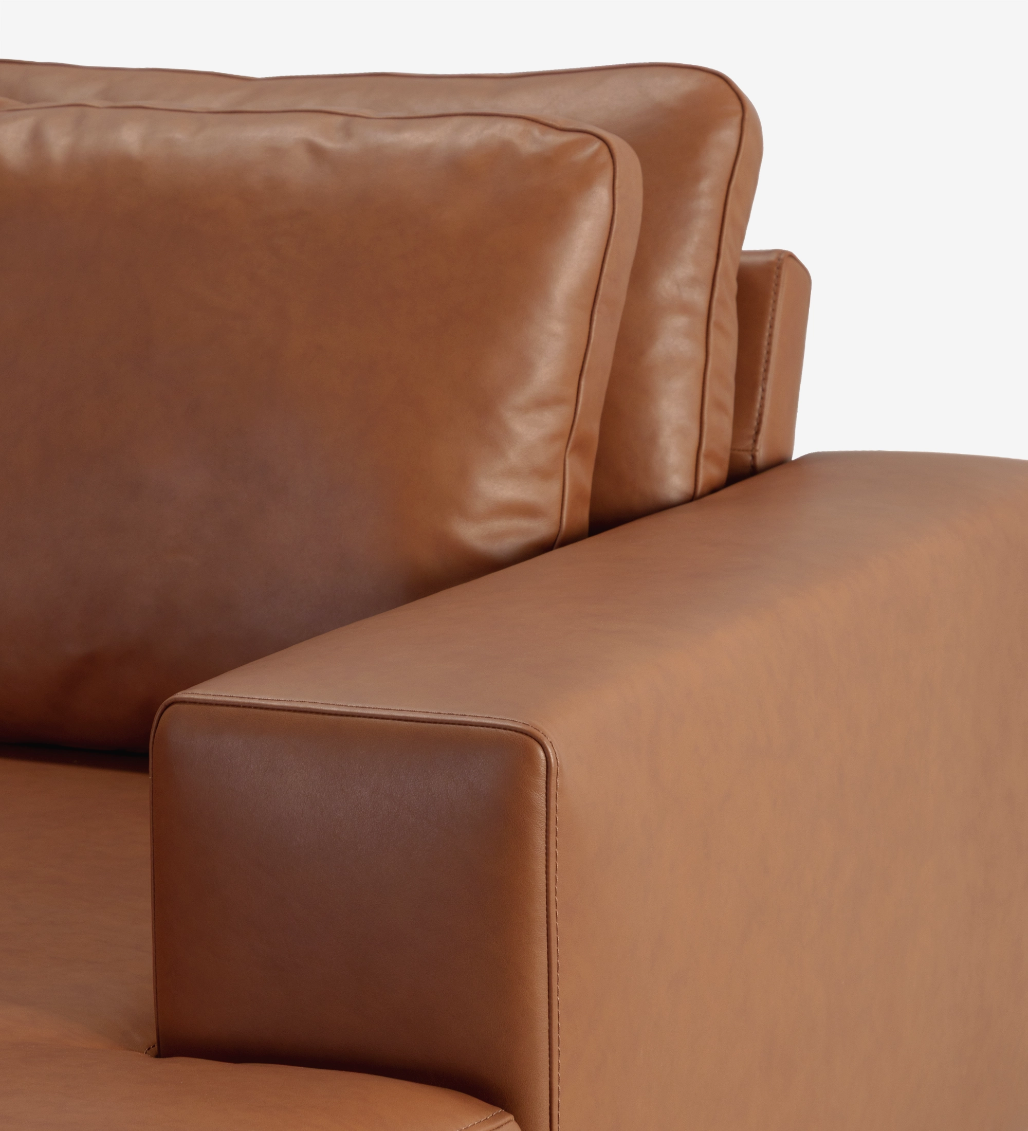 Dallas Sofa with Chaise Longue, brown leather close-up of armrest and cushions