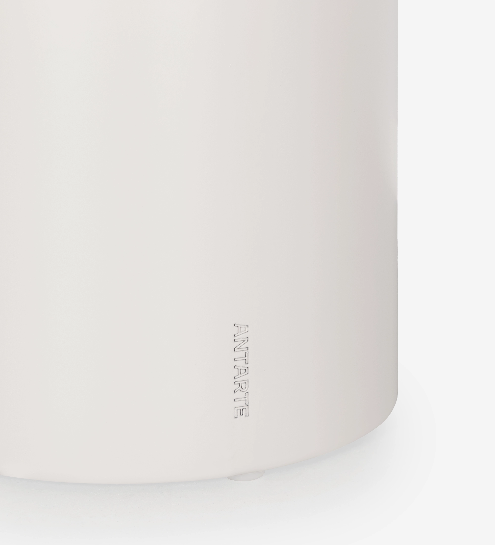 Paris Center Table white cylindrical base with embossed ANTARTE logo