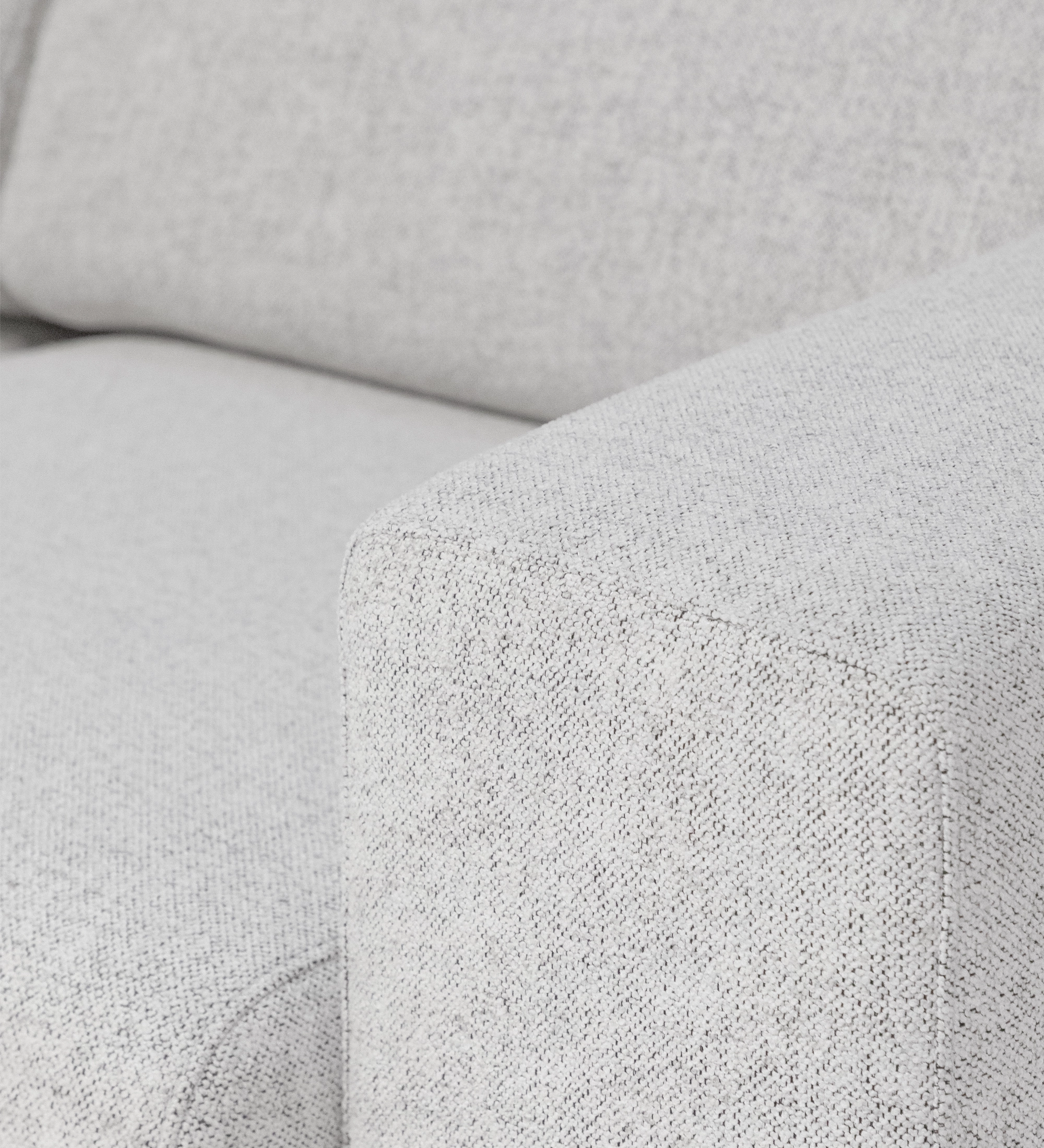 Lagos Sofa with Chaise Longue light grey textured fabric armrest close-up