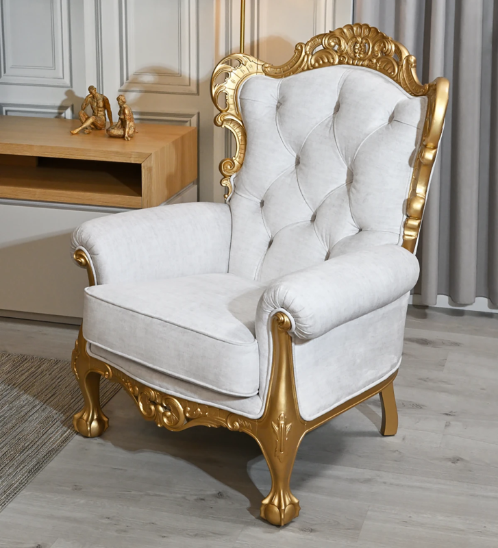 Paris armchair upholstered in pearl fabric, structure and feet lacquered in gold.