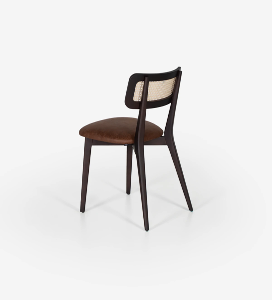 Wood chair, with rattan detail on the back and fabric upholstered seat.