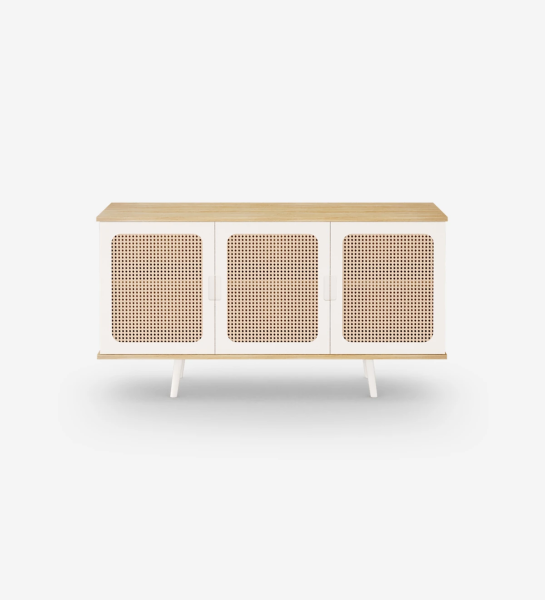 Sideboard with 3 doors detail in rattan, pearl lacquered feet and structure in natural color oak.