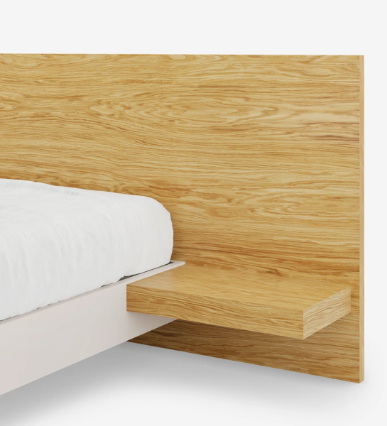 Double bed with headboard and shelves in natural oak, suspended base in pearl.