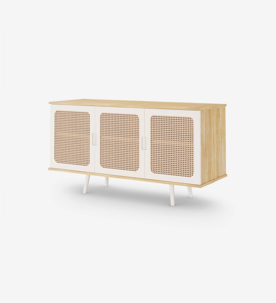 Sideboard with 3 doors detail in rattan, pearl lacquered feet and structure in natural color oak.