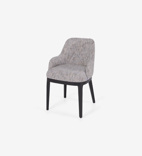 Chair with armrest upholstered in fabric, with black lacquered wooden feet.