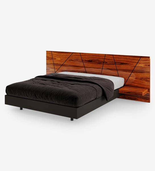 Double bed with abstract headboard and shelves in high gloss palissander, suspended base in black.