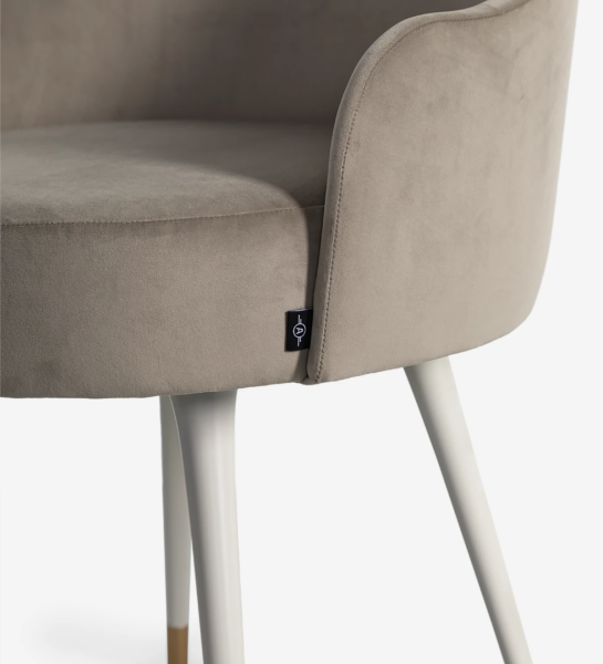 Fabric upholstered swivel chair with pearl lacquered feet and gold detailing.