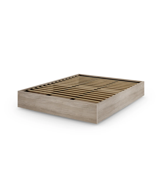 Sommier doble en roble decapé, con plataforma elevable para almacenaje.