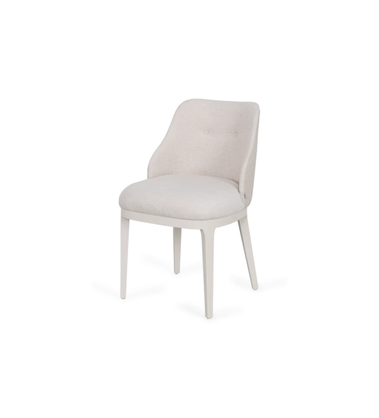 Chaise rembourrée en tissu, avec pieds laqués perle.