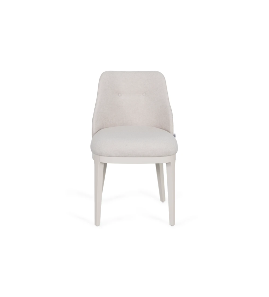 Chaise rembourrée en tissu, avec pieds laqués perle.