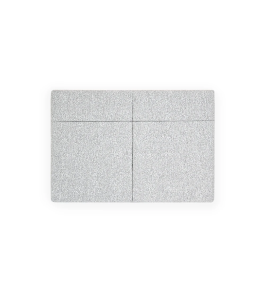 Tête de lit rembourrée en tissu.