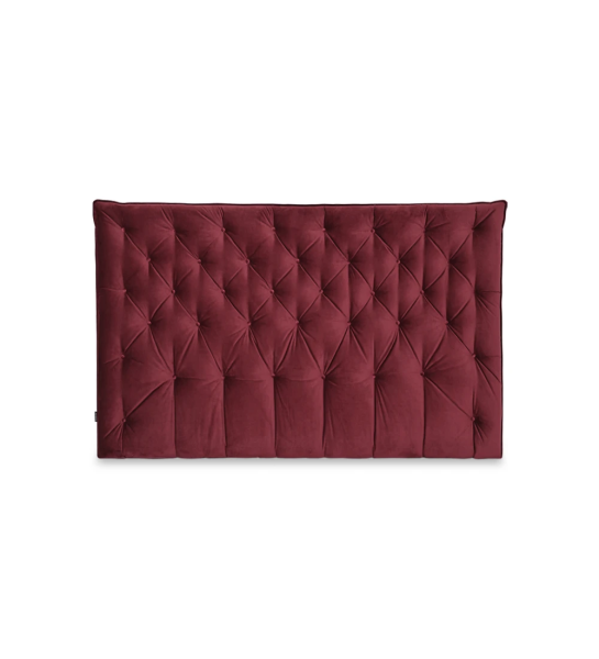 Tête de lit rembourrée en tissu.