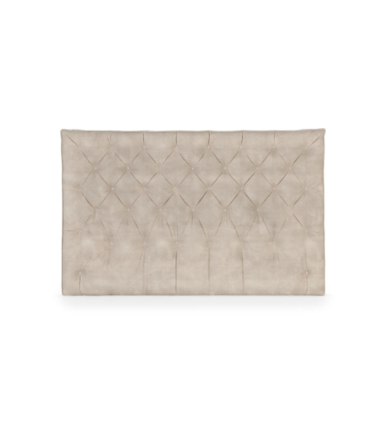 Tête de lit rembourrée en tissu.