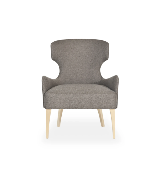 Pico armchair upholstered in toffee fabric, old gold studs, gold lacquered feet.