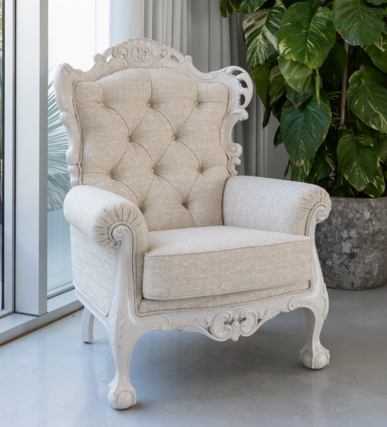 Paris armchair upholstered in beige fabric, structure and feet lacquered in pearl.