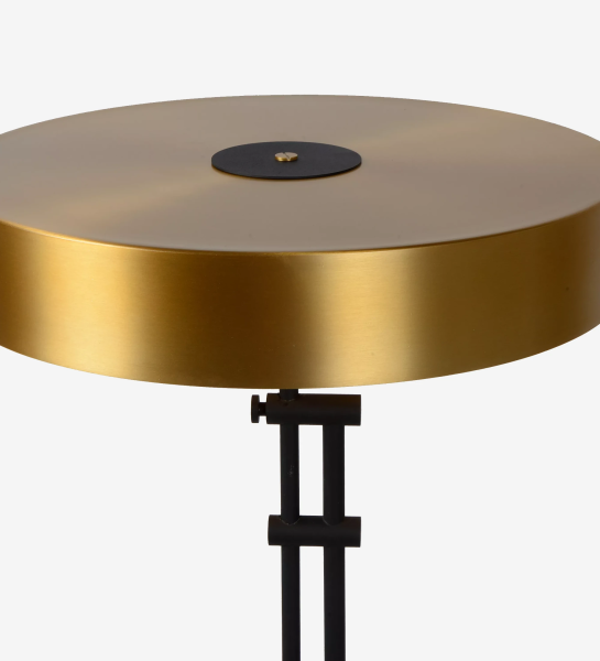 Floor lamp with black marble base and satin gold metal structure.