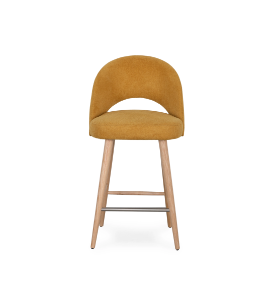 Banco tapizado en tela amarilla, con patas de madera color natural.