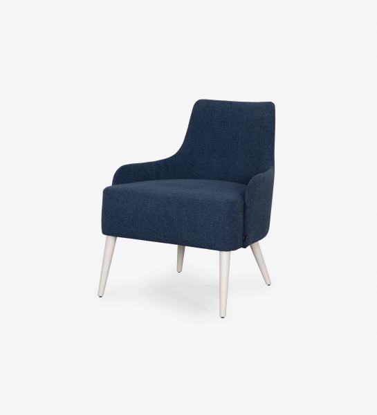 Oslo armchair upholstered in blue fabric, pearl lacquered feet.