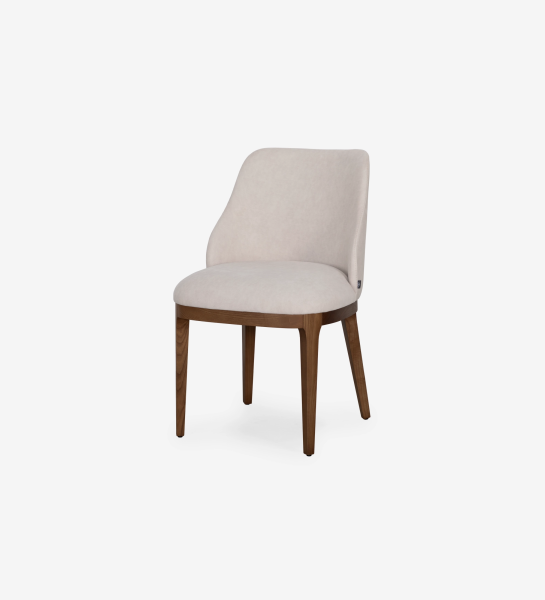 Cannes chair upholstered in beige fabric, legs in walnut-colored ash wood.