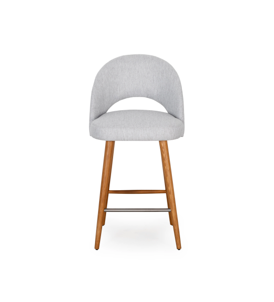 Stool with light grey fabric upholstered, with honey-colored wooden feet.
