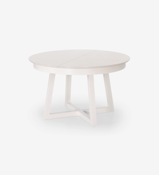 Mesa de comedor redonda extensible en lacado perla con tapa de cristal y extensión en lacado perla.