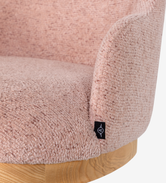 Swivel chair upholstered in pink fabric